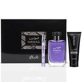 Rasasai Hawas men's 3-piece perfume gift set with bottles of aromatic fragrances and elegant packaging.