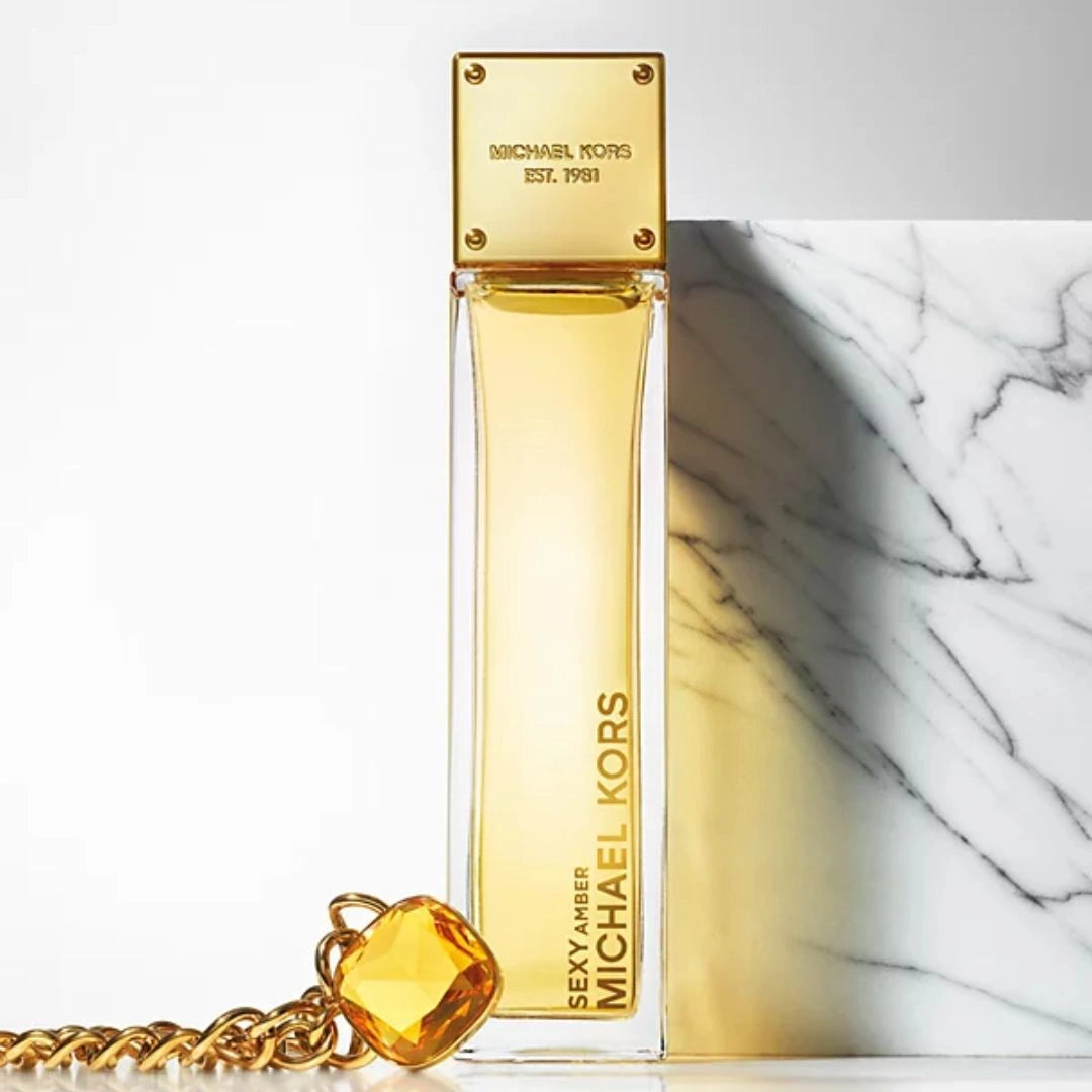 Michael Kors Sexy Amber 4Pc Gift Set (3.4oz EDP Spray, 3.4oz Body Lotion, 3.4oz Shower Gel, 10ml EDP Spray)