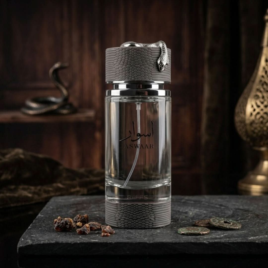 Riiffs Aswaar Extrait de Parfum Spray 100ml, elegant EDP bottle with floral and woody notes visible.
