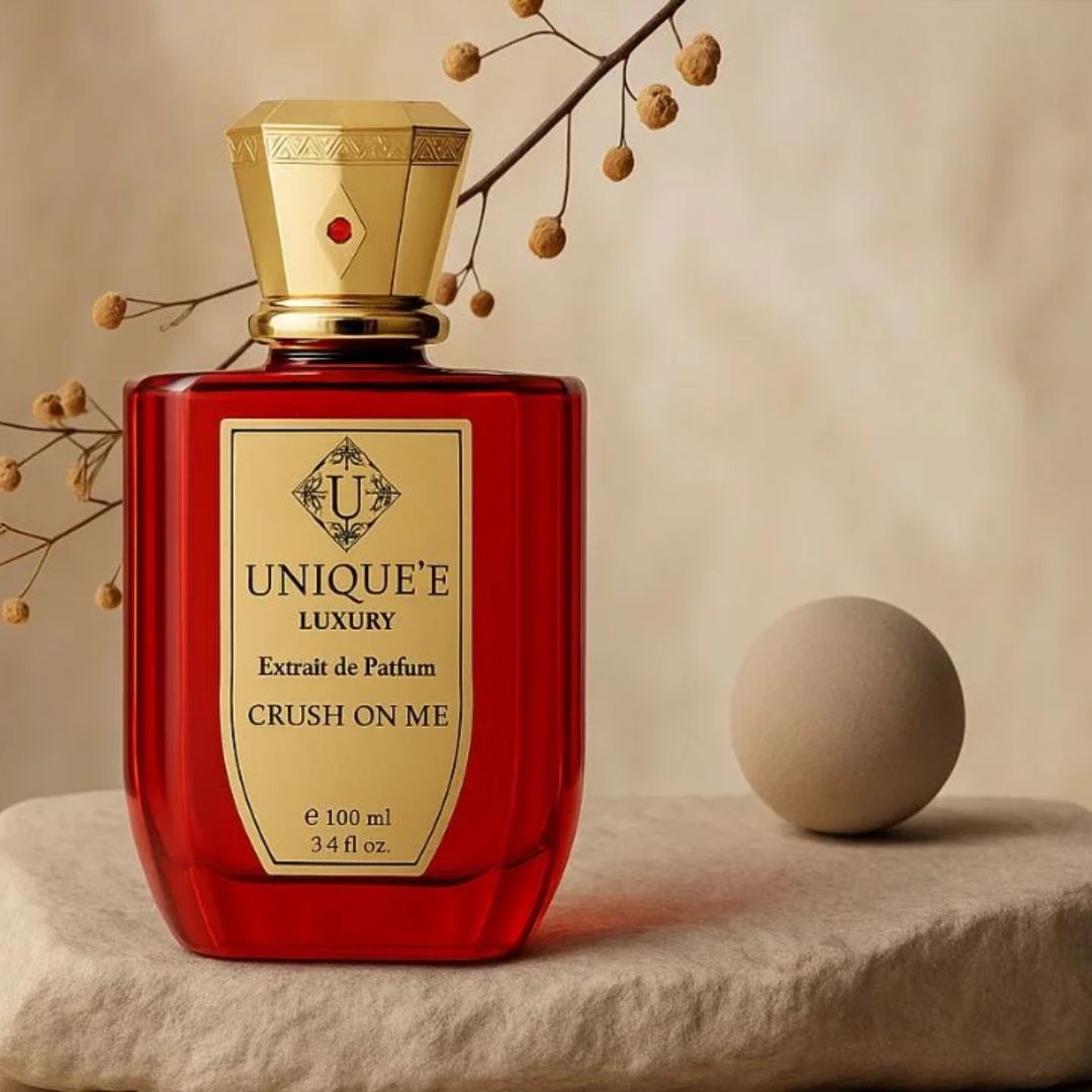 Crush On Me Extrait de Parfum by Unique'e Luxury in a 100ml bottle, showcasing the elegant fragrance packaging.