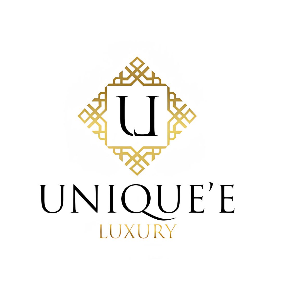 Unique'e Luxury Chocolate Makes Me Happy Extrait de Parfum Spray 100ml bottle with elegant packaging and floral accents.