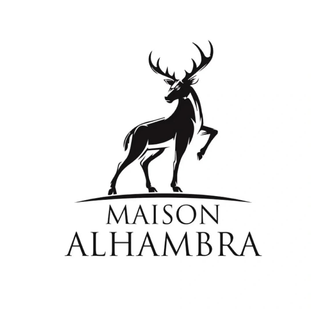 Maison Alhambra Renee Carmine Eau de Parfum spray 100ml with velvet pouch, featuring elegant perfume bottle and branding.