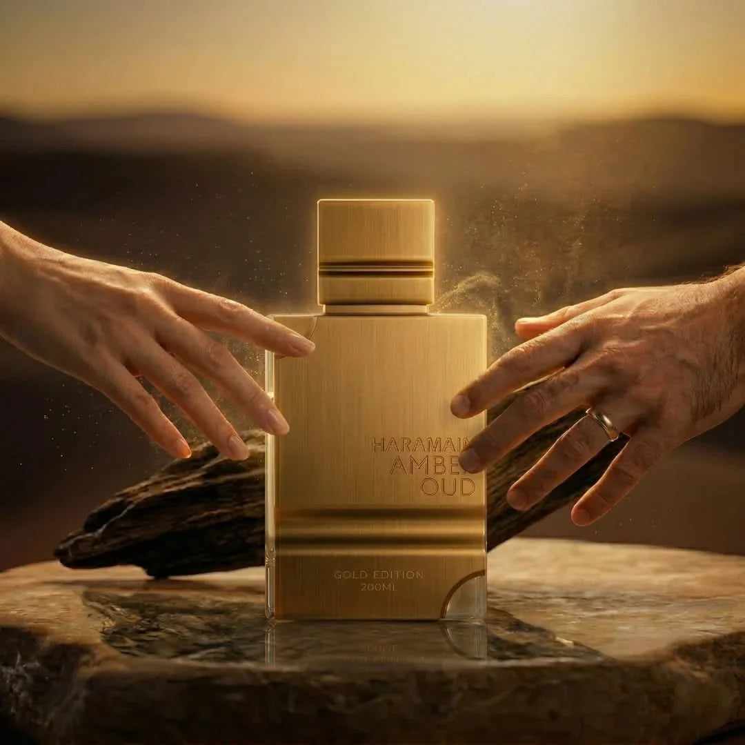 Amber Oud Gold Edition Eau de Parfum spray by Al Haramain showing the elegant bottle with gold accents and amber-colored liquid.